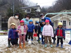 雪だるまと記念撮影