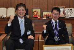 写真：野志市長と久米潤さん