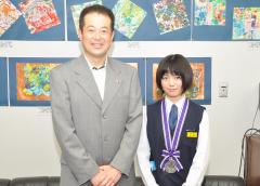 野志市長と天野さんの写真