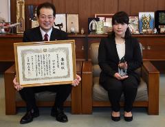野志市長と竹田さんの写真